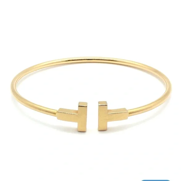 GOLD DOUBLE T WIRE OPEN CUFF BRACELET
